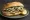 Hamsi Ekmek: an illustration of anchovy, onion and lemon on bread.