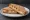 Honey and Walnut: an illustration of cream cheese, honey and walnuts.