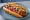 Hot Dog con Tocino: an illustration of sausage and bacon on hot dog bun.