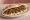 Hummus ma' Lahmeh (حمص مع لحمة): an illustration of lamb, hummus, chickpeas, tahini and more on pita.