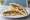 Hummus Sandwich: an illustration of hummus, cucumber, tomato, lettuce and more.