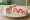 Ichigo Sando - Tochiotome (とちおとめいちごサンド): an illustration of strawberry and whipped cream on shokupan.