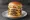 In-N-Out 4x4: an illustration of beef, american cheese, lettuce, tomato and more on burger bun.