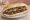 İnegöl Köfte Ekmek: an illustration of beef and onion on bread.