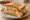 Isaac Toast — Ham Special Toast: an illustration of ham, egg, cheese, cabbage and more on white bread.