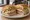 Italian Hoagie: an illustration of capicola, salami, ham, provolone and more on hoagie roll.