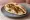 Jaffa Style: an illustration of fish and hummus on pita.