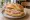 Jagdwurst Brötchen: an illustration of pork, sausage and mustard on kaiser roll.