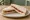 Jeely Piece: an illustration of jam and butter on white bread.