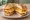 Jersey Breakfast Sandwich: an illustration of egg, american cheese and hash browns on kaiser roll.