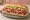 Jersey Mike's Original Italian: an illustration of ham, capicola, salami, pepperoni and more on hoagie roll.