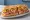 Jersey Shore Italian Sub: an illustration of capicola, prosciutto, salami, provolone and more on hoagie roll.