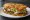 Jibarito: an illustration of beef, cheese, garlic, mayonnaise and more.