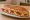 Jumbo Tost: an illustration of sucuk and cheese on bread.