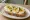 Kanapka z Jajkiem: an illustration of butter, egg, mayonnaise and scallion on bread.