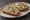 Kanapka z Pastą Rybną: an illustration of butter, fish, onion, lemon and more on bread.