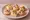 Kanapki Koktajlowe: an illustration of ham, cheese, egg, butter and more on bread.