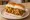 Kanda Bhaji Pav: an illustration of onion, pepper, cilantro and olive oil on bread.