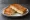 Kaşarlı Tost: an illustration of butter on bread.
