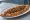 Kavurmalı Pide: an illustration of beef, onion and parsley on pita.