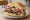 Kebab: an illustration of beef, cabbage, onion, tomato and more.