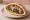 Kebab b'Pita (קבב בפיתה): an illustration of beef, onion, parsley, tahini and more on pita.