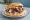 Kebab Wołowy: an illustration of beef, cabbage, onion, tomato and more.
