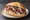 Kebab z Baraniny: an illustration of lamb, cabbage, onion, tomato and more.