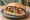 Kebab z Falafelem: an illustration of falafel, cabbage, onion, tomato and more.