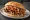 Kebab z Sosem Ostrym: an illustration of beef, chicken, cabbage, onion and more.