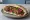 Kibbeh Sandwich (ساندويش كبة): an illustration of lamb and onion on pita.