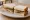Kipper Sandwich: an illustration of herring and butter on white bread.