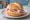 Kochschinken Brötchen: an illustration of ham and butter on kaiser roll.