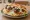 Köfte Sandwich: an illustration of beef, lamb, tzatziki, lettuce and more.