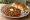 Kolhapuri Pav Bhaji: an illustration of potato, tomato, onion, butter and more on bread.