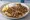 Kotopoulo me Riganatos: an illustration of chicken and oregano.