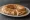 Koulouri me Zampon kai Tyri: an illustration of ham and cheese.