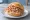Krabbenbrötchen: an illustration of shrimp and butter on kaiser roll.
