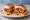 Kutchi Dabeli: an illustration of potato and onion on bread.