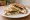 Labneh ma' Za'atar (لبنة مع زعتر): an illustration of yogurt and olive oil on pita.