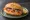 Lachs Brötchen: an illustration of salmon, butter, dill, lemon and more on kaiser roll.