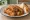 Lahana Sarma: an illustration of beef, cabbage, rice, onion and more on bread.