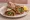 Lahmacun: an illustration of lamb, beef, tomato, onion and more.