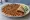 Lahmacun Acısız: an illustration of lamb, tomato, parsley and pepper.