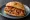 Lampredotto con Salsa Piccante: an illustration of the sandwich.