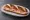 Laugenstangen Sandwich: an illustration of ham and butter.