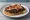 Laverbread and Bacon: an illustration of the sandwich.