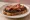 Laverbread on Toast: an illustration of bacon and butter.