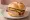 Leberkäse mit Senf und Essiggurke: an illustration of pork, beef, mustard and pickle.