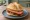 Leberkässemmel: an illustration of pork, beef, bacon and mustard.